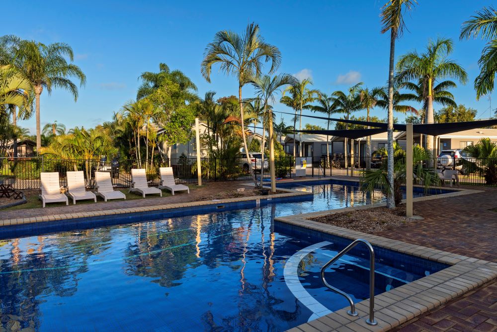 Outdoor pool with sun lounges at Fraser Street, Hervey Bay